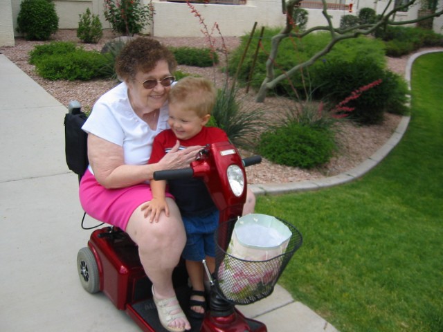 Nathan on Great Grandma's scooter